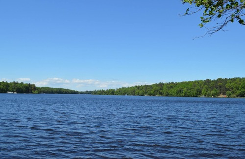 Spooner House | ESCAPE AT THE LAKE, relax and enjoy your stay in this immaculate LAKE HOME!