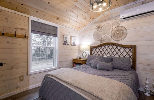 Corinth Cabin | Escape the city at "In the Meadow," a serene cabin in Kentucky's countryside.
