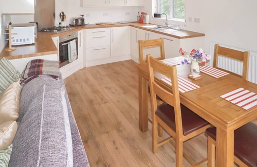 Hopton Castle Cottage | Escape to a modern riverside lodge, perfectly set by the tranquil River Clun.