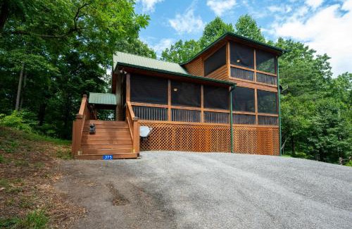 Foxfire Estates House | Escape to Dream Catcher - Enjoy cozy accommodations, and a variety of entertainment options including a hot tub, game room, and