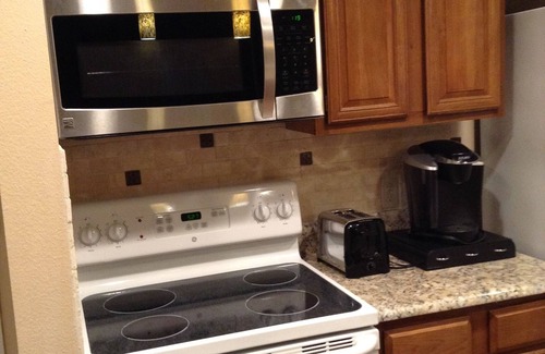 Granite Shoals Condo | Escape to my Tropical Gem on Lake LBJ! Beautiful Condo, Beach,2 Pools!