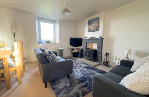 Calder Bridge House | Escape to our Cosy Cottage with Log Burner in Drigg, Lake District
