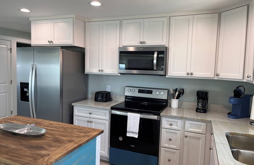 Fort Morgan Pines Cottage | Escape to Pelican's Perch on Mobile Bay w/Beach & Pier! Great Golfing Nearby!
