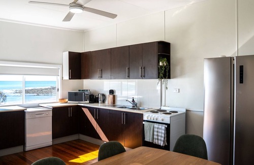 Arrawarra Headland House | Escape to Salastraf, a stunning 3-bedroom retreat offering breathtaking views of the marine park and