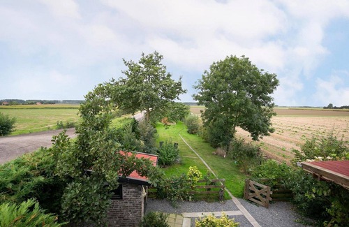 Municipality of Sluis House | Escape to the peaceful countryside of Biervliet and embrace the serene life in this charming holiday home.