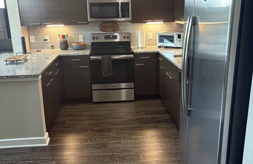 Las Colinas Apartment | Escape to this modern,western-style home located steps away from the scenic lake