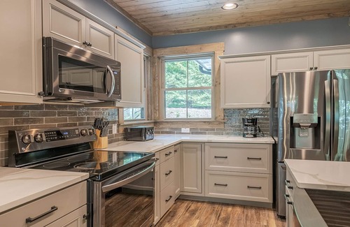 Maggie Valley Cabin | Escape to tranquility in this 3 bed, 3.5 bath Maggie Valley home on the creek!
