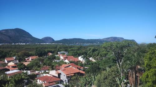 Niteroi House | Espaço Verano- quarto Família