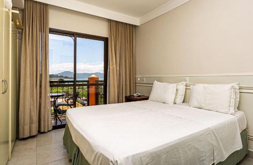 Jurere Resort | Estúdios Modernos em Resort pé na areia - Jurerê Beach Village JBVJR