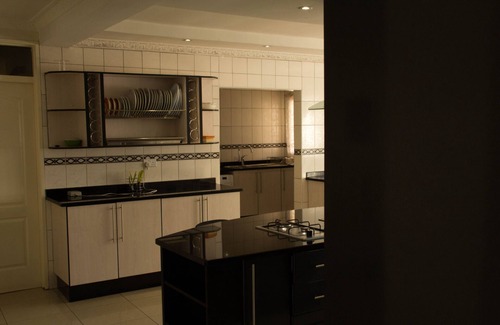Harare House | Esther and family at Westgate Lodge