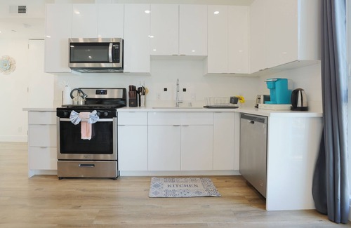 Harbor Gateway South Apartment | EV Charger Ready Grandeur Abode 4B2.5B