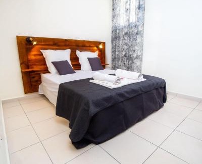 Port-Louis Apartment | Evasion en plein cœur de la ville T2 Jacuzzis Sauna et piscine au centre de Port-Louis