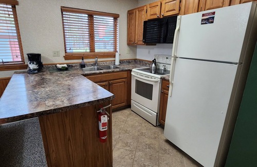 Bartlett Condo | Evergreen Lodge at Attitash Mountain base, ski, hot tubs, pool, WIFI & Fireplace