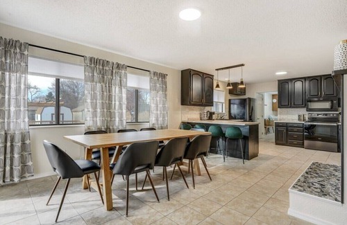 Park Vista House | Evergreen Luxe! Backyard Oasis w/Pool & Hot Tub!