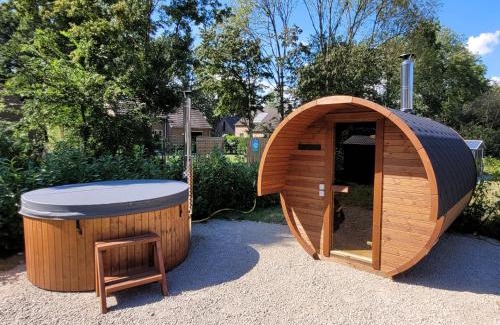 Ewijk House | Evergreen wellness met sauna & hottub