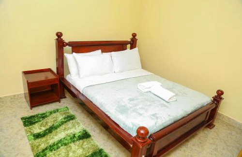 Fort Portal House | Everland Volcanic Suites