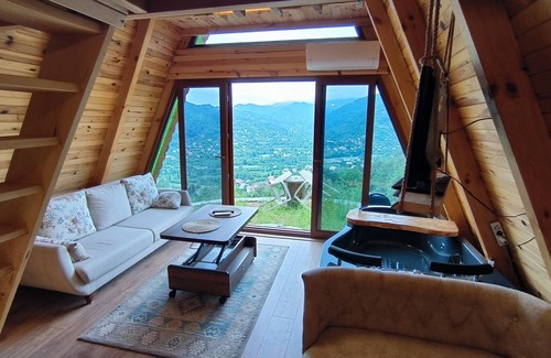 Arhavi House | Evi are Completely First Class Wood and Have a Fireplace. You can Sleep in Front