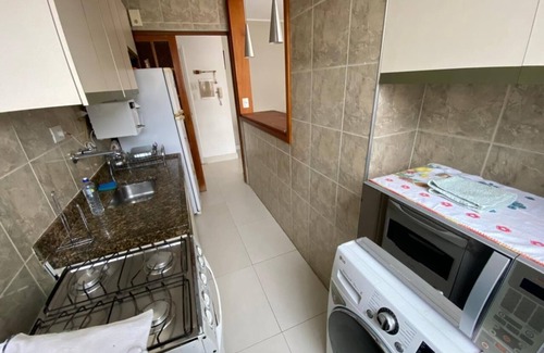 Gonzaga Apartment | Excellent apartment, right on the sand, in front of Praia do Gonzaga in Santos,