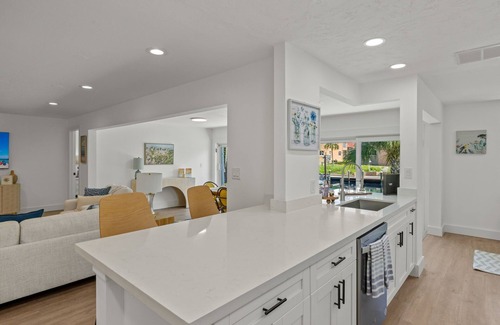 Shell Harbor House | Exceptional canal front home, beautiful design, steps to beach!