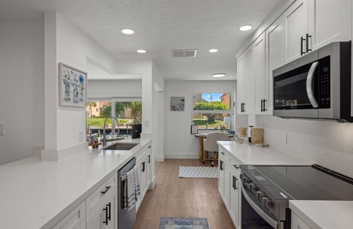 Shell Harbor House | Exceptional canal front home, beautiful design, steps to beach!