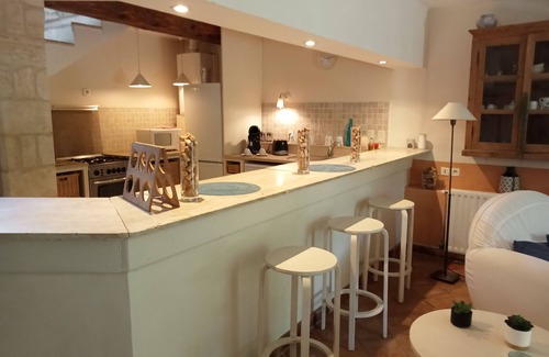 Saint Michel d'Euzet House | Exceptional setting, a renovated former mill on the banks of the river, 6-hectare park.