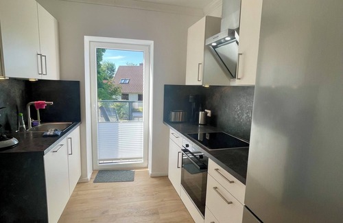 Altefaehr Apartment | Exclusive apartment with harbor view - 200m to the beach promenade on Rügen
