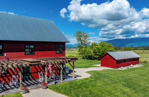 Kalispell House | Exclusive Guest Ranch with 13 bedrooms, Train Caboose and Hot Tub Lookout!