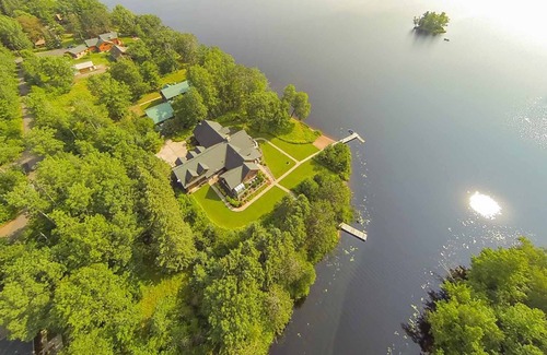Hayward Cabin | Exclusive Home On Chippewa Flowage- 3.6 acres with sand beach and two Private docks