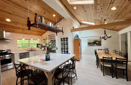 Powers Lake Villa | EXCLUSIVE LAKEFRONT with beach, beach house, piers, trampoline + sister villa