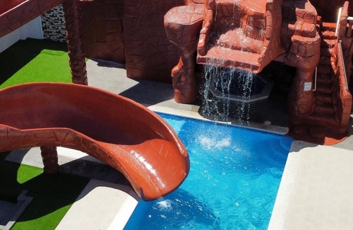 Cerro alto Villa | Exclusive Luxury Villa: Private Water Slide & Spa Oasis