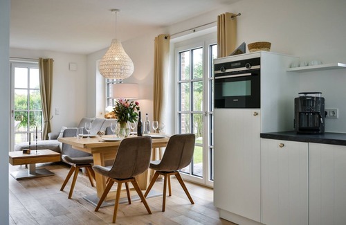Tinnum House | Exclusive new-build house with garden and wonderful salt marsh views. -