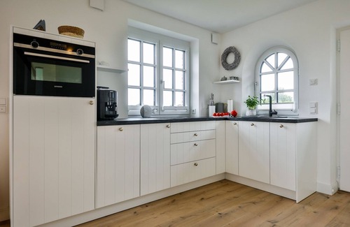 Tinnum House | Exclusive new-build house with garden and wonderful salt marsh views. -