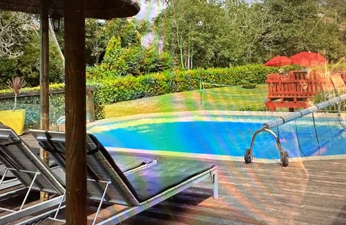 Ancora House | Exclusive riverside retreat, heated pool and jacuzzi, 17 people, on the beach.