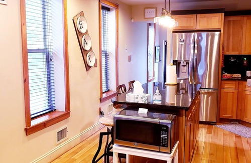 Downtown Baltimore House | Exclusive Sunken Living Room Soaring Exposed Brick