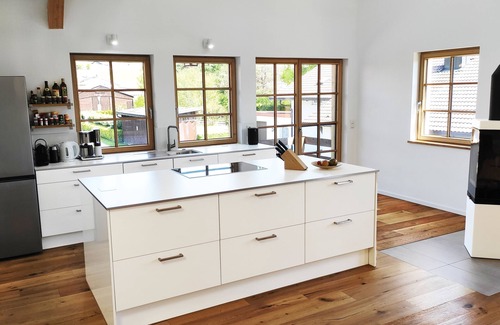 Gorisried Apartment | Exclusive, sunny new-build vacation apartment with the flair of a former barn