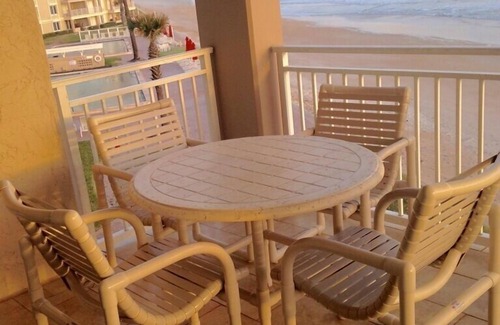 New Smyrna Beach Condo | Exclusive third floor three bedroom three bath end condo!