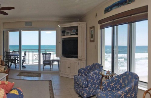New Smyrna Beach Condo | Exclusive third floor three bedroom three bath end condo!