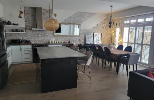 Waterloo Villa | Exclusive Townhome near West-Side Trails