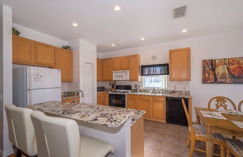 Crescent Lakes Villa | Executive 4 bed 3 bath villa, lake view, large pool with spa 30 mins from Disney