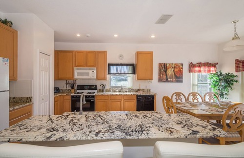 Crescent Lakes Villa | Executive 4 bed 3 bath villa, lake view, large pool with spa 30 mins from Disney
