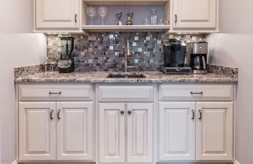 Buechel House | Executive East End Derby Home with Heated Pool