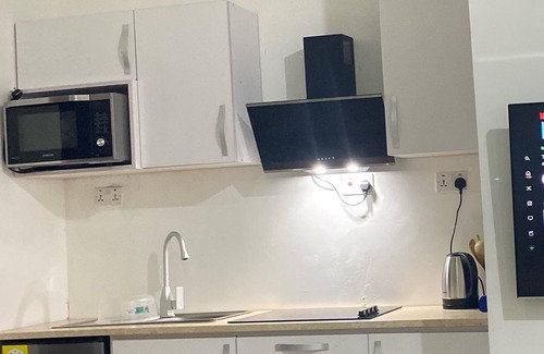 North Legon Apartment | Executive suite with a pool