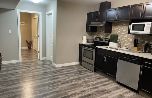 Edmonton Apartment | Executive suite walking distance to Mill Creek ravine & downtown
