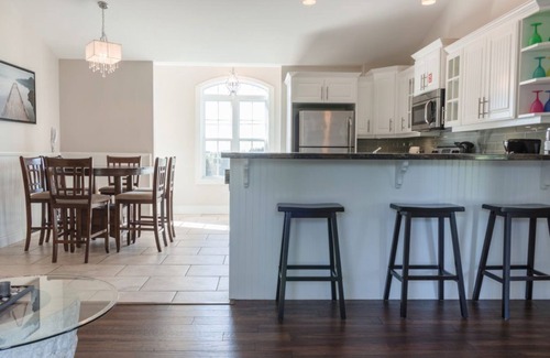 Stanley Bridge Condo | Executive suite with outdoor hot tub and fire pit | Golf View, close to pool