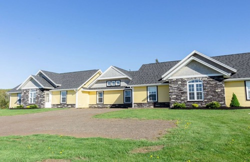 Stanley Bridge Condo | Executive suite with outdoor hot tub and fire pit | Golf View, close to pool