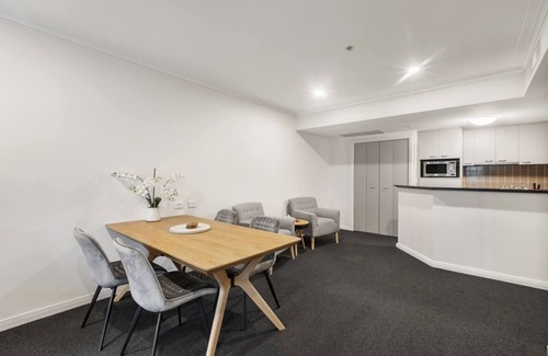 Chinatown Apartment | Executive Urban Living with Balcony Heated Pool
