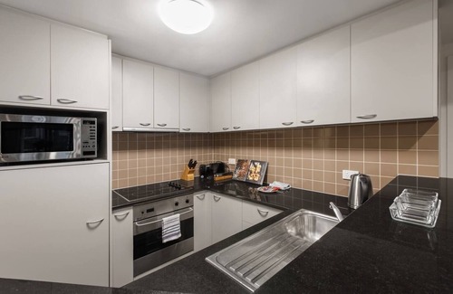 Chinatown Apartment | Executive Urban Living with Balcony Heated Pool