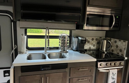 Parkland House | "Experience Enchantment: Book Your Dream Stay at The Magic Motor Home Today!"