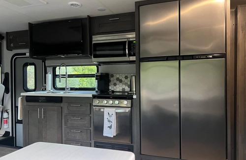 Parkland House | "Experience Enchantment: Book Your Dream Stay at The Magic Motor Home Today!"
