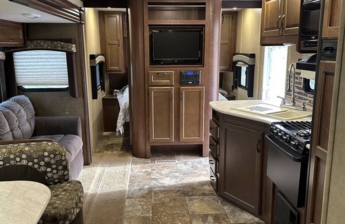 Carterville RV Rental | Experience Glamping in style. Private Hot tub spa! Private lake -Pet Friendly